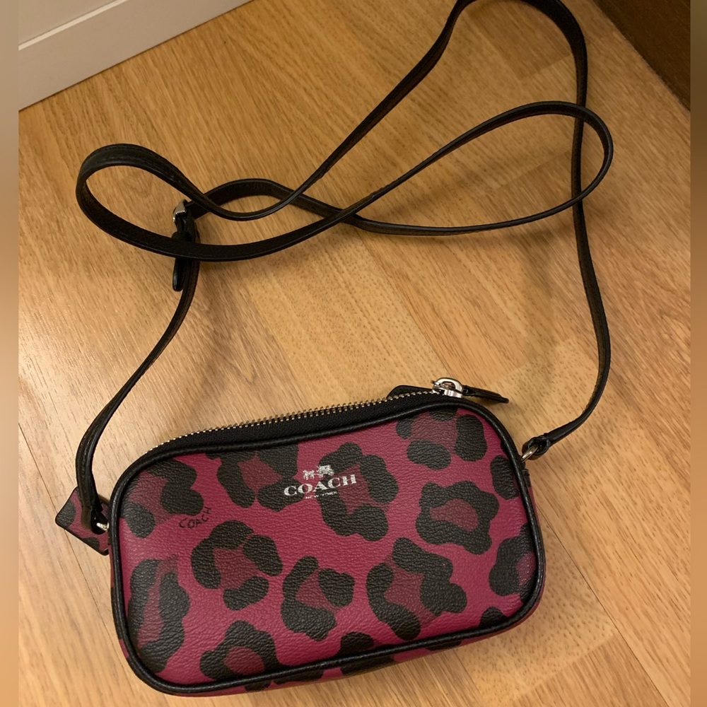 Small pink and black leopard Coach bag